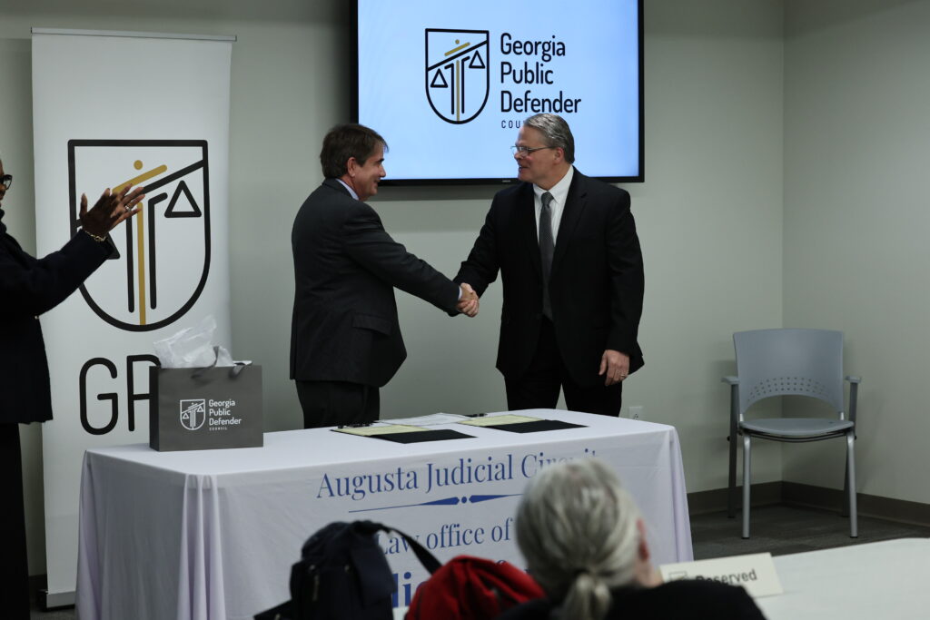 Augusta Circuit Public Defender Lee Prescott with Dublin Circuit Public Defender Clay Tapley following the administration of the oath.
